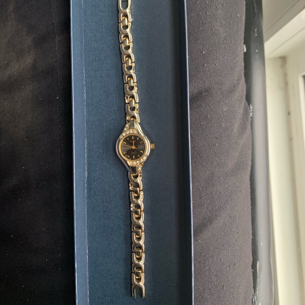 USED VINTAGE OMAX WATCH